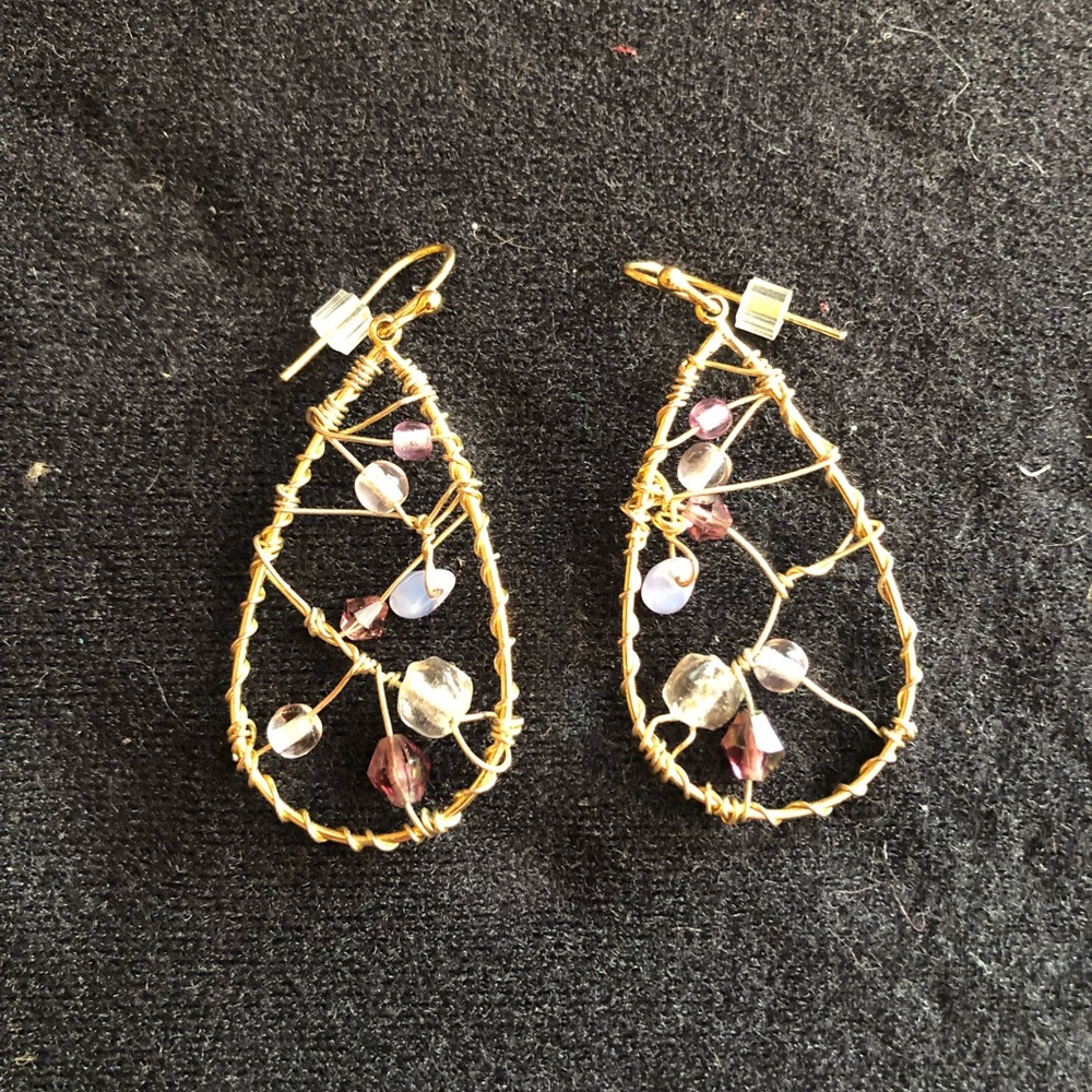Hoop earrings with bead and wire design